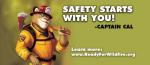 2019 4_fingers anthro armor backpack biped captain_cal claws clothed clothing cougar digital_media_(artwork) english_text eyebrows felid feline fingers firefighter front_view fur happy headgear helmet looking_at_viewer male mammal mascot pulaski simple_background smile solo standing text turnout_gear uniform unknown_artist url whiskers